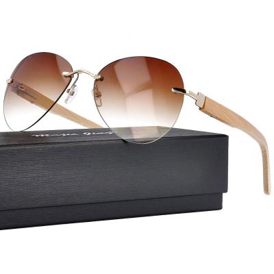 China Fashion Sunglasses Vintage Sun Glasses Shape Mens Womens Bamboo Sun Glasses Custom Spring Sun Glasses UV400 Rimless Oval Wooden Hinge for sale