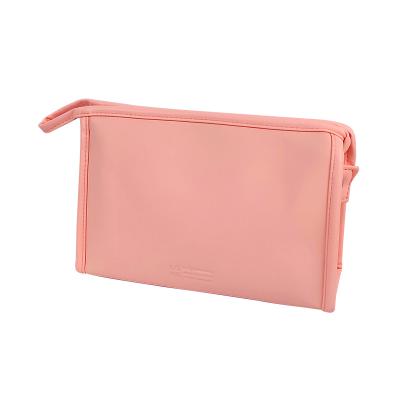 China Fashion style simple PU makeup bag, portable handy storage bag, color small fresh candy girl's heart storage bag for sale