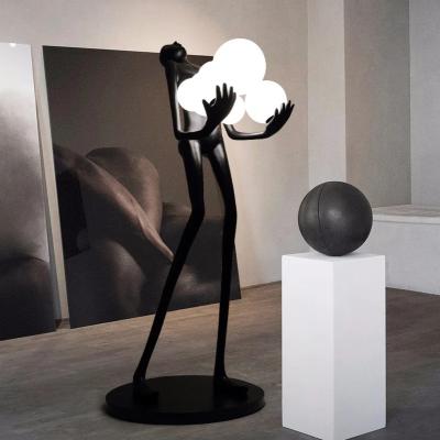 China 2023 Nordic Atmospheric Hotel Living Room Lamp Geometry Resin Modern Hotel Man Body Sculpture Standing Human Floor Lamp for sale