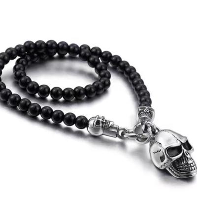 China Stainless Steel Punk Skull Personality Jewelry Non Mainstream Fashion Agate Pendant Necklace For Men for sale