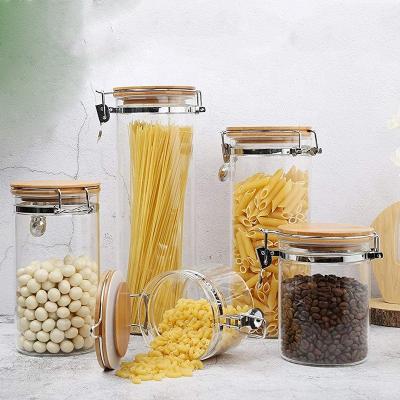 China Food Grade.ECO-Friendly Borosilicate Glass Food Storage Jar Cut Top Clear Glass Jar With Airtight Flange Bamboo Lid for sale