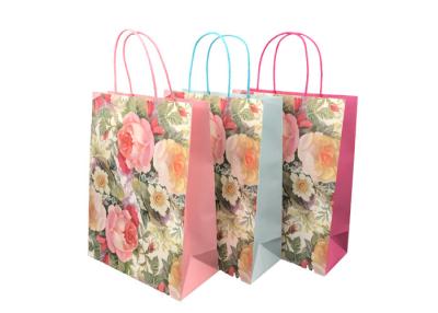 China Diseño de papel promocional sostenible exquisito del estampado de plores de los bolsos del regalo en venta