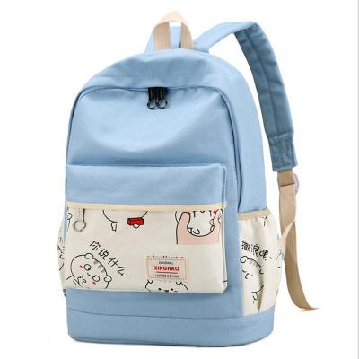 China Students Canvas Bag Large Capacity Waterproof Running Printing School Bag For Boys And Girls for sale