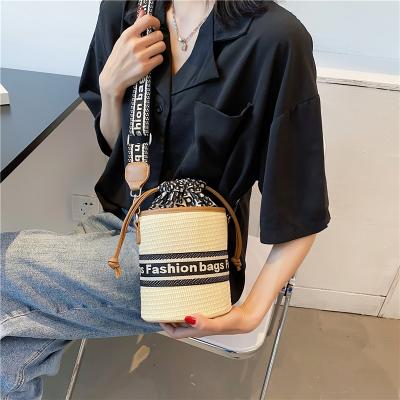 China Fashion Bucket Bag\Fashion Comfortable 2021 Women\`s Durable Handbags Wholesale New Printed Basket Woven Bag Cross Body Bag for sale