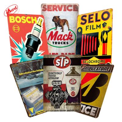 China Europe Vintage Man Cave Wall Decoration Auto Repair Parts Shop Retro Tin Sign Spark Plug Metal Sign Garage Tire Battery Metal Poster for sale