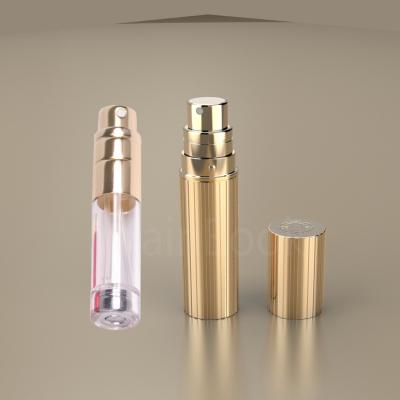 China Wholesale Private Custom Logo 5ml Gold Bottle Body Perfume Bottle Transparent Pink Personal Care Refilling Spray for sale