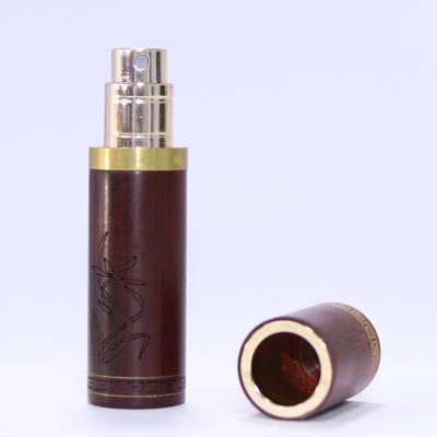 China Lurury Customize Various Logos Travel Portable Wood Grain Magnetic Cover Empty Sprayer Perfume Sample Bottle Travel Spray Bottom Refill for sale