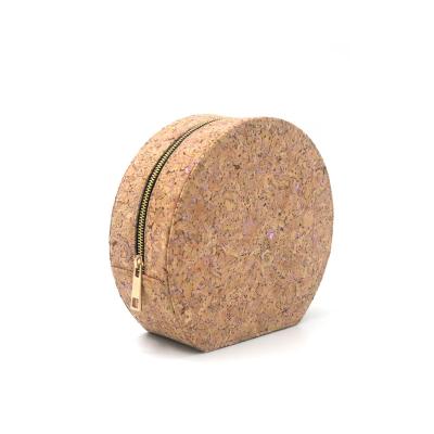 China Normcore/Cork Toiletry Bag Popular Round Eco-Friendly Minimalist Shape Waterproof Cork Makeup Bag for sale