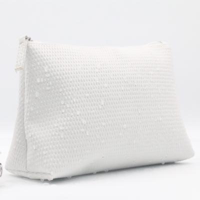 China Wholesale Pure White Ripple Pattern Water-based Makeup Bag Minimized Waterproof PU Leather Cosmetic Bag for sale