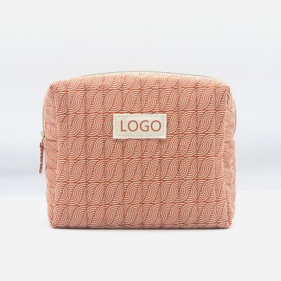 China Product Recycled Orange Line New 2022 Vintage Print Cotton Makeup Bag Retro Style Basketball Swirl Cosmetic Bag for sale