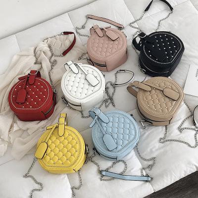 China 2022 factory wholesale fashion new women's bag round diamond rivet fashion small hand-held small cross-body soft shoulder bag for sale