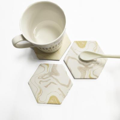 China 2021 viable hot sale with good quality waterproof ceramic hexagon coaster with stand for sale