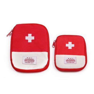 China Viable Medical Nylon First Aid Kit Emergency Bag Zipper Bags First Aid Kit Storage Classification Empty Multi-cell Bag for sale