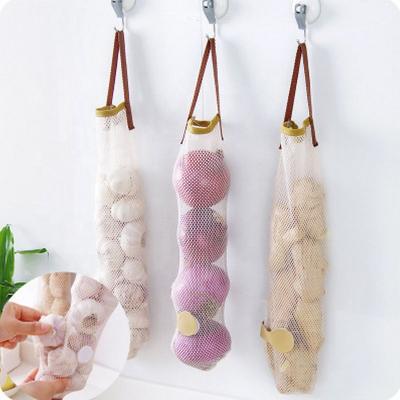 China New Style Viable Garlic Ginger Hanging Storage Bag Mesh Bag Kitchen Onion Potato Storage Bags for sale