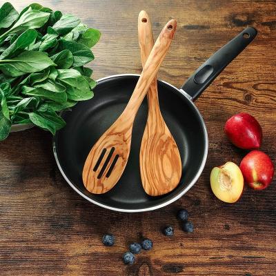 China 2 Piece Sustainable Olive Wood Spoons for Baking, Non-Stick Wooden Slotted Spoon and Corner Spoon Set for sale