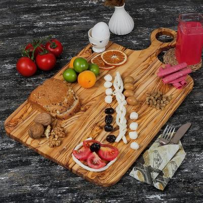 China Olive Wood Cutting Board Sustainable 21 Inch Large Meat Breakfast Serving Board for sale