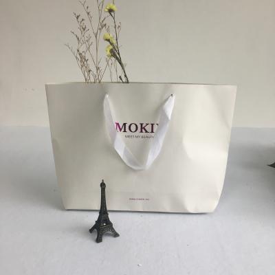 China Custom Recyclable White Card Paper Bag Logo With Logo Paper Shopping Bag With Handles for sale