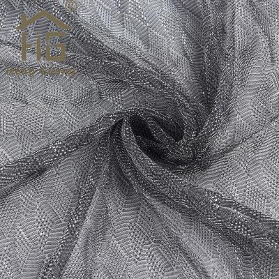 China 2022 Customs Designer Metallic Yarn 100% Polyester Fabric Yarn Fabric Metallic Textile For Dresses Clothes for sale