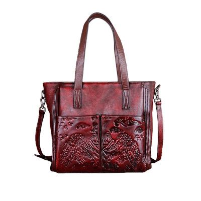 China Large Capacity Daily Used Layer First Whip Tide Hand Embossing Tote Bag Retro High End Vegetable Tanning Process Cross - Body Bag for sale