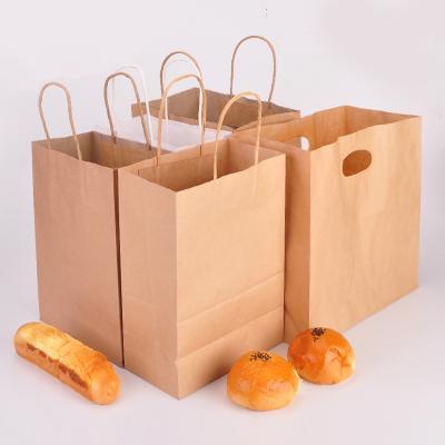 China Recyclable Wholesale Souvenir Apparel Matte Laminated Flat Handle Paper Bag for sale