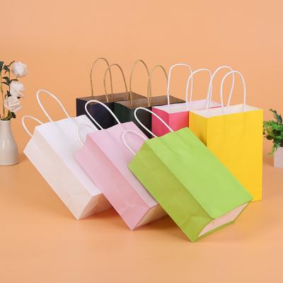 China Recyclable Custom Printing Merry Christmas Kraft Paper Shopping Gift Bag With Custom Logo for sale