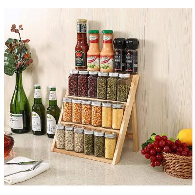 China Custom Made Eco-Friendly 4-Tier Wooden Spice Organizer Multifuctional Rack Home Storage Bamboo Kitchen Spice Rack Organizer for sale