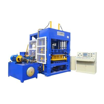 China Building Material Shops QT4-15 Semi-automatic Cement Brick Making Machine in Mozambique for sale