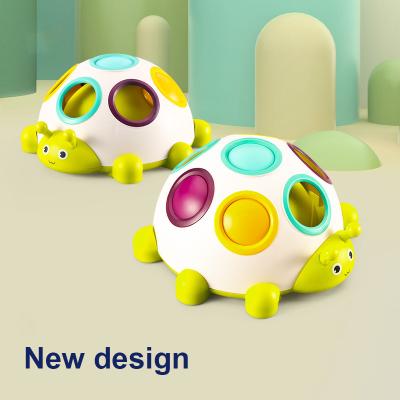 China Eco-Friendly Baby Education Learning Cartoon Finger Toys For Early Infants Kids Beetle Shape Educational Wiggle Noise Toy for sale