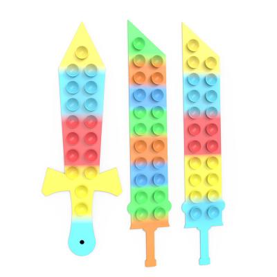 China 2022 New Eco-friendly Suction Squidopop Strap Toys Stir Strap Toys Decompression Sword Shape Silicone Stirrer Toys Squidopop for sale