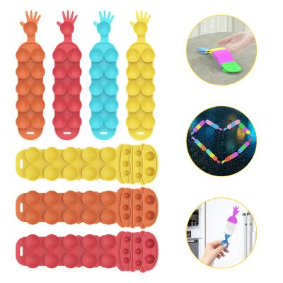 China Eco-Friendly Wholesale Noise Push itting sucker stir toys Squidopop Ring Squidopops Bracelet Toy Suction Strap Antistress Fidget for sale