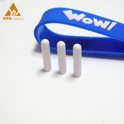 China Plastic Bullet Studs ABS Tube Shape Plastic Studs / Studs Custom Size Plugs For Sweatpants Drawstrings Forming Wear Strings for sale