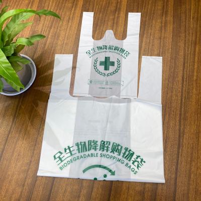 China 100% Biodegradable Compostable Carry Bag With Handle Eco Friendly Green T-Shirt Bag for sale