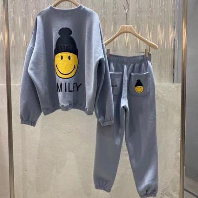 China 2021 two-piece QUICK DRY women's sports spring and autumn new fashion casual women's pants two-piece suit smiling face alien sweater for sale