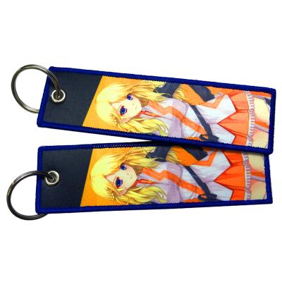 China Customized Double Anime Modern Logo Sublimation Printing Fabric Woven floral animal Keychains for souvenirs sublimation key chain for sale