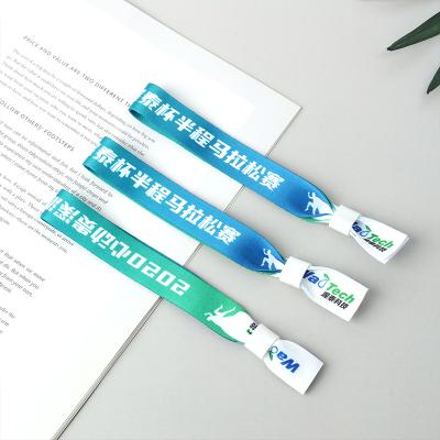 China All Around The World Clip Event Party Festival Promotional Eco-Friendly Plastic Adjustable Fabric Woven Woven Sublimation Wristbands for sale