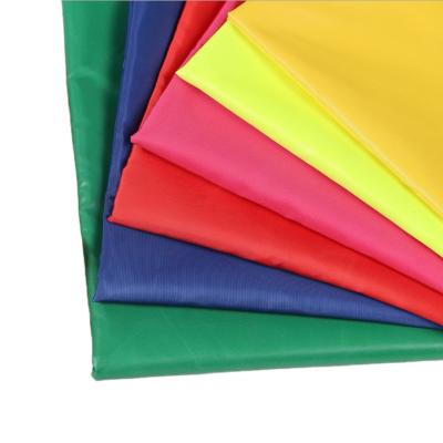 China 100% poly taffeta fabric waterproof 190T 210T 100 shantung iridescent polyester taffeta striping fabric for leather bags clothes lining for sale