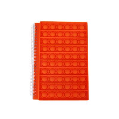 China Mini Cute Elementary School Children Silicone Bubble Notebook A6 Enlightenment Decompression Notebook for sale