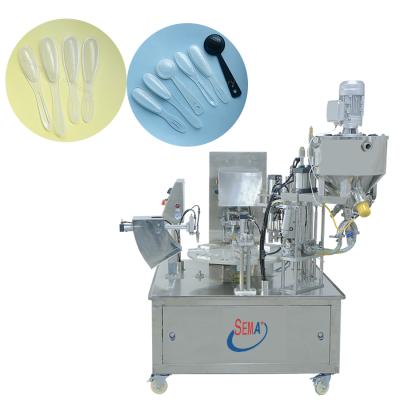 China Food Honey Spoon Foil Sealing Machine Filling Packing Machine for sale