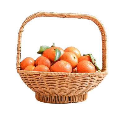 China Handcrafted Mold Proof Snacks Fruit Woven Gift Picnic Rattan Handle Organizer Storage Basket for sale