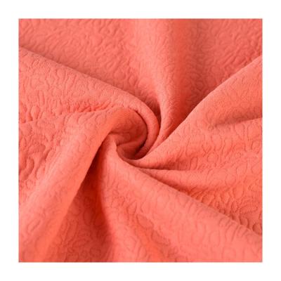 China Sustainable Wholesale Custom Stretch Jacquard Knitted Polyester Solid Fabric For Woman Garment for sale