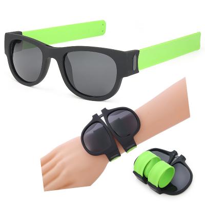 China 2022 Lightweight Wholesale Silicone Plastic Strap Around UV400 Foldable Polarized Wristband Snap Rolls Women Men Folding Sunglasses for sale