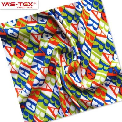 China New Products 4 Way Breathable Stretch Waterproof Knitting Letter Printed Nylon Fabric With Spandex For Swimwear for sale