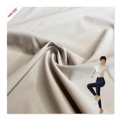 China Plain Nylon Fabric Stretch Spandex High Elasticity Knitted Stretch Fabric Hygroscopic And Sweat Release For Yoga Use for sale