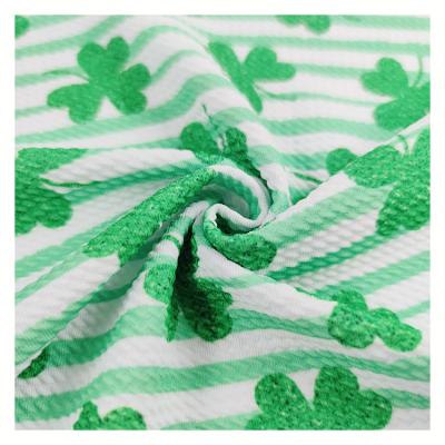 China China supplier Tear-resistant design popular ball fabric St. Patrick's Day digital printing for dress and bows for sale