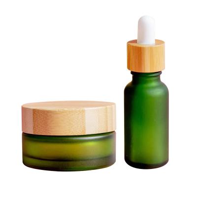 China TAOTAOJU Accessories Skin Care Products Accessories Ring Essence Lotion Face Cap Non-Refillable Cosmetic Wooden Cream Bottle Bamboo Lid for sale