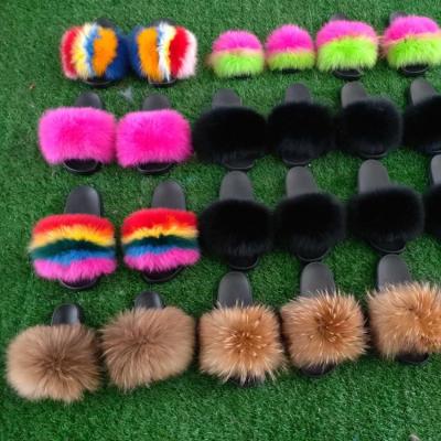 China Fashion fluffy plush fur factory wholesale cute indoor ladies slippers soft raccoon slides sandals with logo for sale