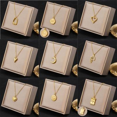 China Fashion Swapping 18K Gold Stainless Steel Eye Moon Love Necklace Women's Cross Heart Shaped Necklace for Men and Women for sale