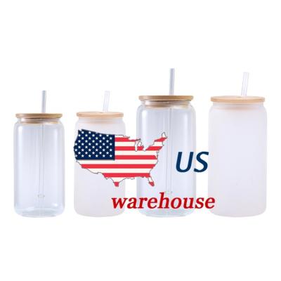 China Sustainable USA Warehouse 16oz Frosted Glass Clear Sublimation Beer Can Glass Jar With Bamboo Lid And Straws for sale