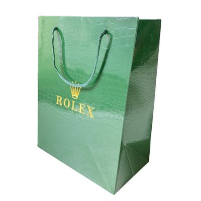 China Wholesale luxury handmade green color gold stamping logo printing watch box packaging role leatherette paper bag in stock for sale