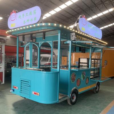 China Camiones de comida móviles de 4 ruedas para carritos de perritos calientes y concesión de restauración en venta